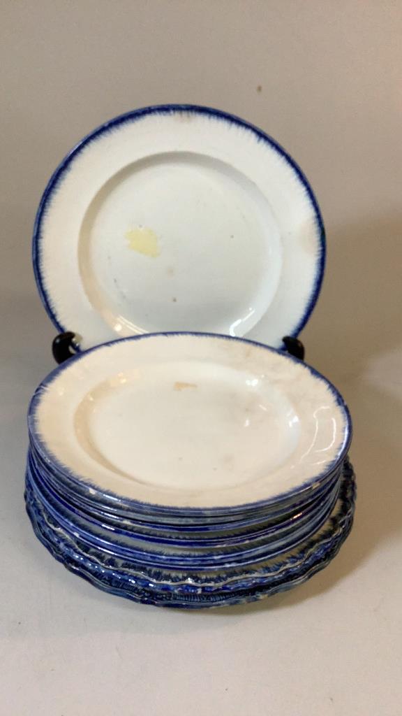 10 Pieces Feather Edge Ironstone: 10.5 inch charger, three 10 each plates, 6 rim soup at 9.5 inches, cobalt feather edges to all, some tiny chips, and interior wear
