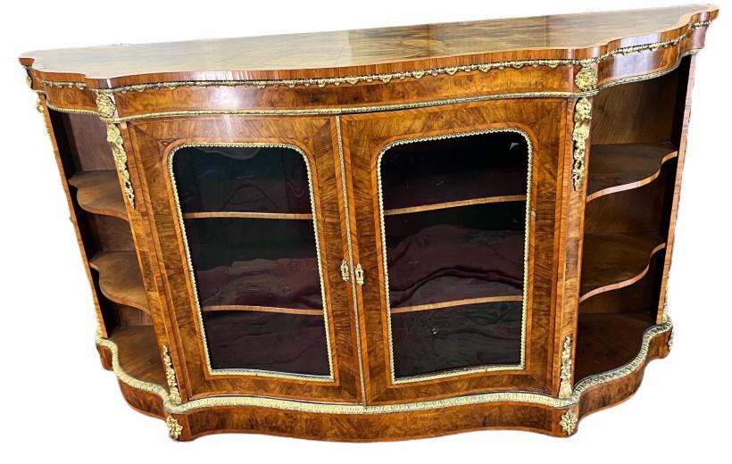 Louie XVI Style Burl Walnut Sideboard: Brass ormolu mounts, serpentine front, center doors flanked by corner shelves