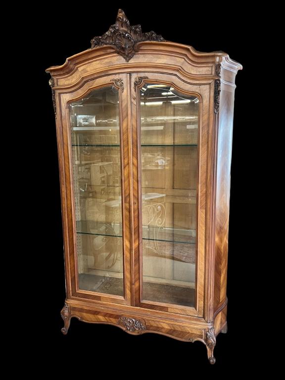 Carved Walnut French Provincial Armoire: Beveled glass doors, shell carved cornice, missing a few carved elements, 102 tall x 60 wide x 18 deep.