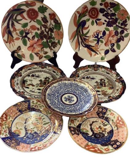7 Pieces Porcelain/Ironstone: Pair 9 inches plates, bold floral on white, 7 inch single plate Royal Lily, pair 9 inch Masons ironstone, 7 and 8 inch Coalport plates, similar designs gilt w/ iron red and cobalt* minor crazing, hair