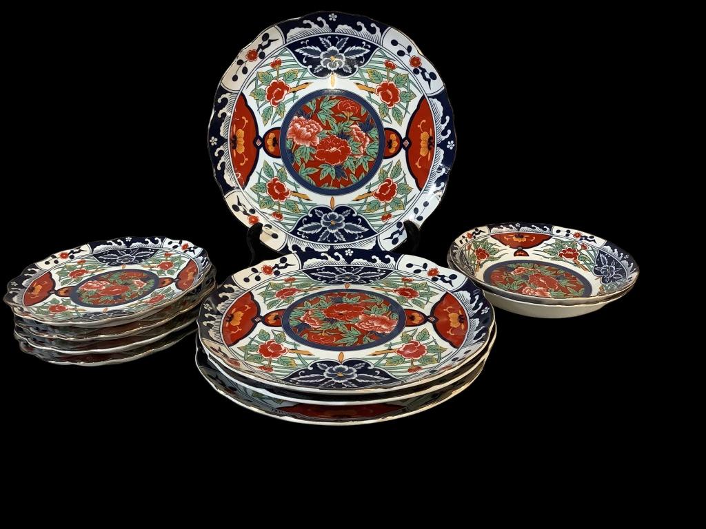 Gumps Kiku Porcelain Tablewear: Rimmed blue and rust Oriental design, 4 -10 inch and 7 inch plates, 2- 7.5 inch bowls