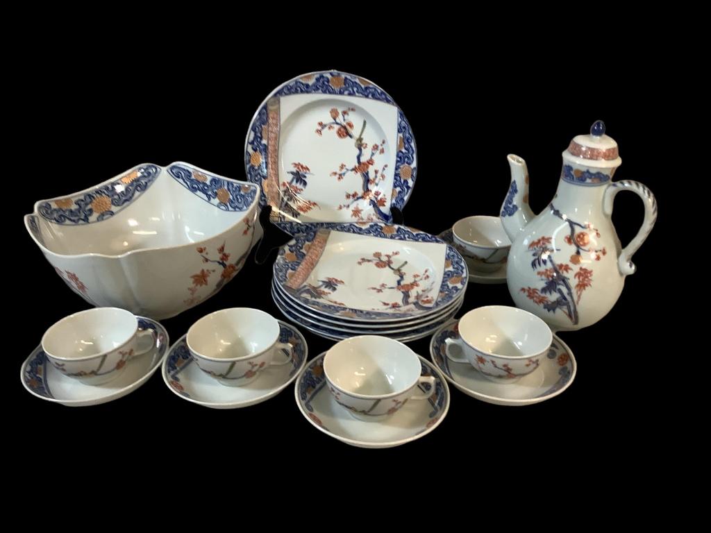 Mottahedeh Lotus Scroll: 18 Pieces, beautiful pattern Imari Lotus Scroll, after a 1715 design, 6- 9 inch rimmed plates, 9.5 inch open bowl, coffee pot, 5 complete cup/saucer sets, 8 inch shell form dish