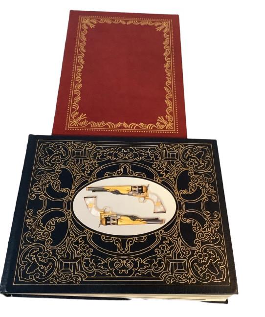 2 Leather Bound Weaponry Books,: Signed First Edition, Steel Canvas by RL Wilson, #476/1000, Easton Press color photos, The Kentucky Rifle by Captain John GW Dillinger, 1998 Palladium Press, both books moire end pages, gold page ends
