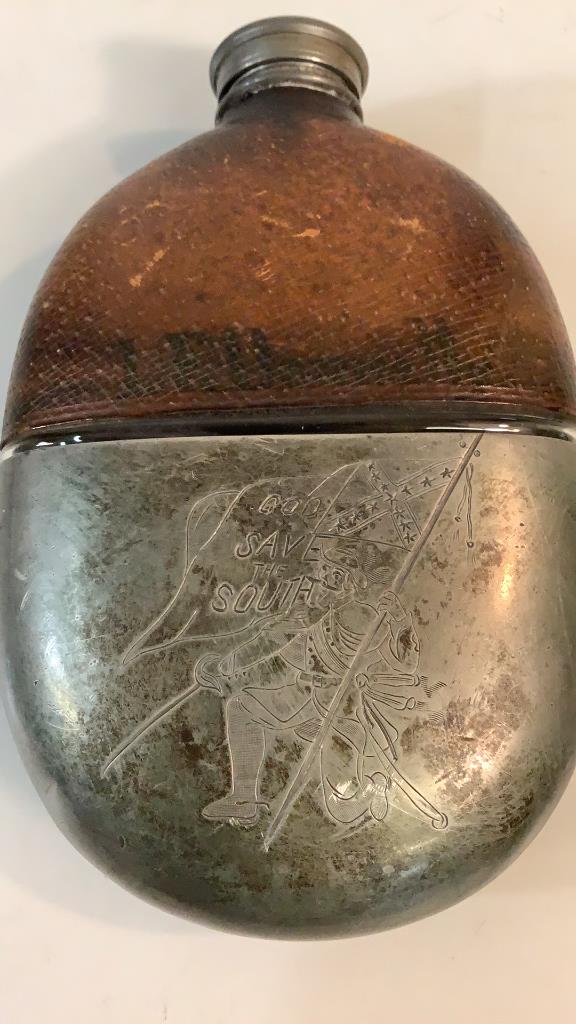 Hip Whiskey Flask, Engraved Pewter Half Body: 6.5 inch lozenge shaped flask, lower pewter case reads God Save The South..screw on pewter cap James Dixon and Sons, leather covered upper body, ..the lower pewter casing could be removed and used as