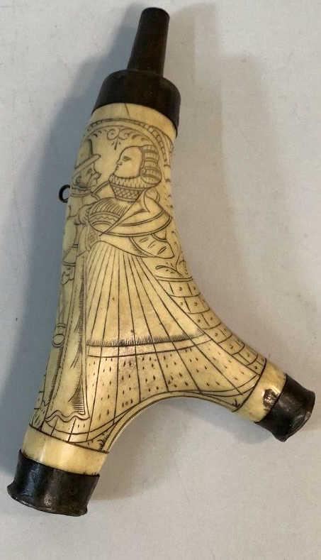 Wheelock Musket Powder Flask: Scrimshaw Antler with Brass Mounts, 9.5 x 4 inches, pewter caps, Elizabethan scene to front piece