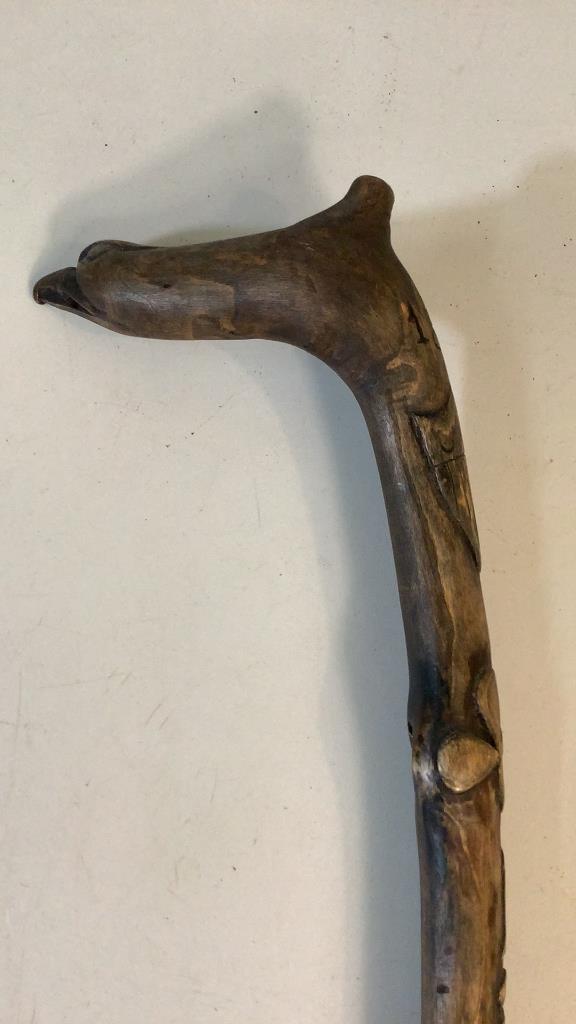 POW Cane: Reputed as made by POW in NC Prison Camp, traded for tobacco, 34 inch carved wood cane, , 1863 date, with shamrock , Union Shield, Eagle handle