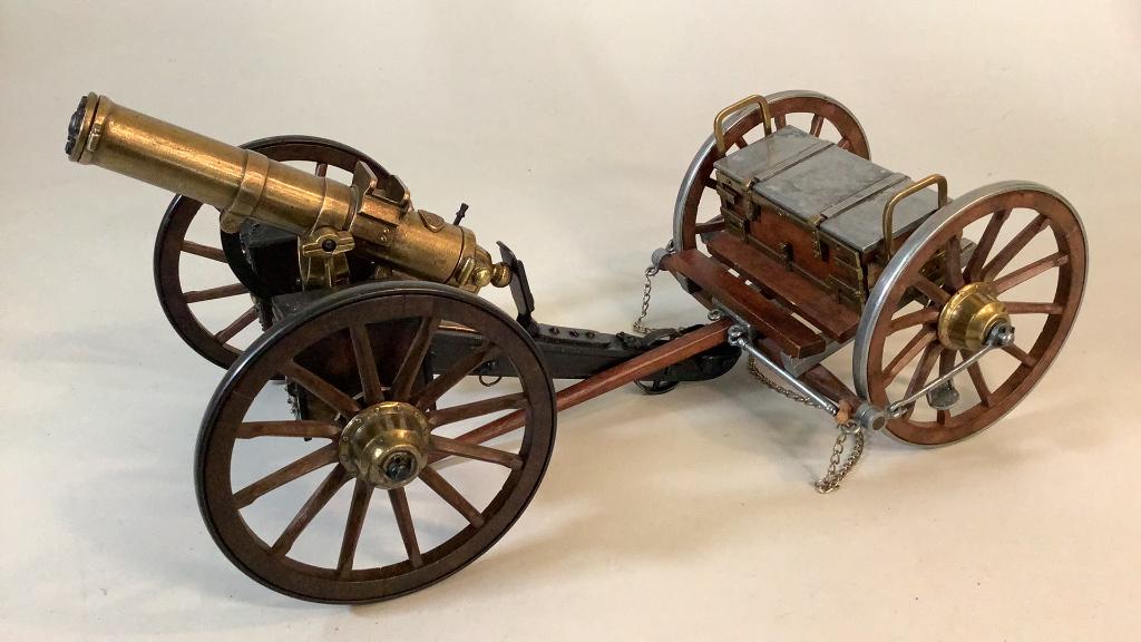 Model 1883 Gatling Gun, Ammo Safe: 15 x 9 inch large Civil War replica marked Hartford Conn, w/ hand crank cast carriage, side boxes, and a 12 x 8 pull along ammo box on wheels lift top, steel capped wheels, good condition, not authent