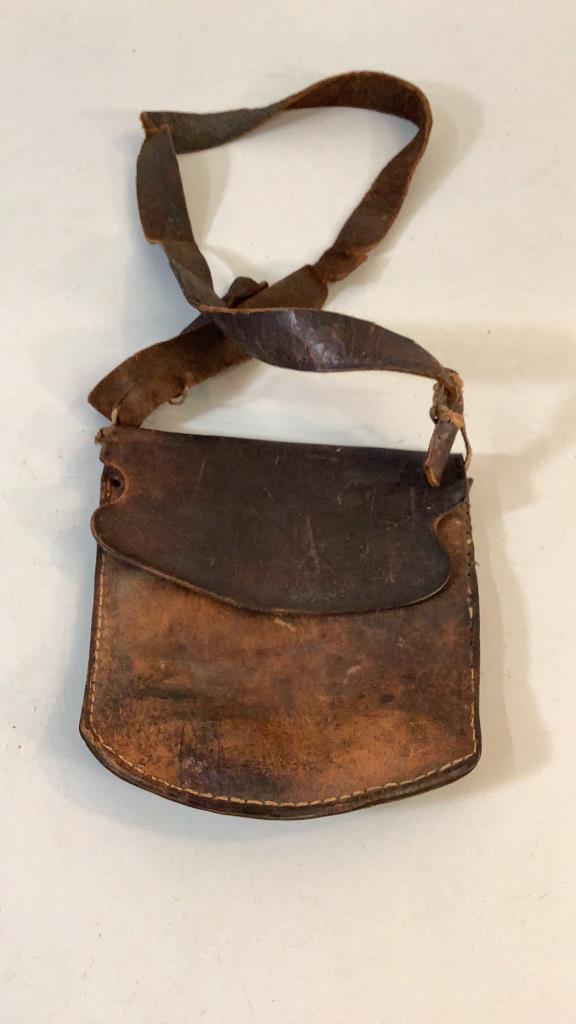 Rifleman Hunting Bag: 7.5 inch bag with flap front, dressed deer skin, leather shoulder strap