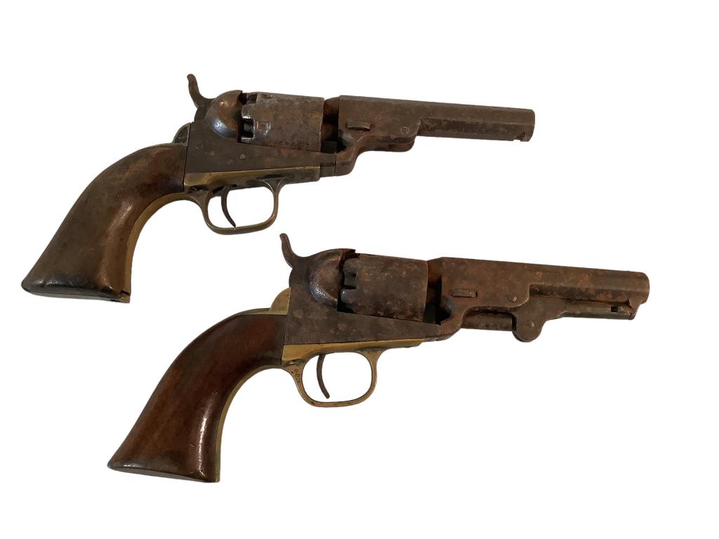 Two Pistols: Colt five shot, 9.5 inches # 3303550 ( rough condition ), six shot pistol, markings unclear, 9 inches, # 202682