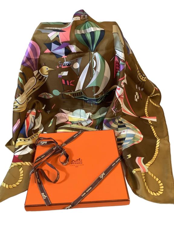 Hermes Silk Scarf: Follies du Ciel ..Madness in the Sky , scarf in silk twill with hand rolled edges, stamped Hermes- Paris, 34 x34 inches , golden brown with multi colors, includes traditional Orange box with Hermes Ri
