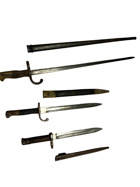 3 Antique Bayonets W Scabbards: French Model 1847 with scabbard 25.5 total length, M1908 bayonet, Brazilian Mauser rifle, Weyersberg Kirschbaum & Solingen CO, with scabbard 17 long, unidentified wood handled bayonet w scabbard marke