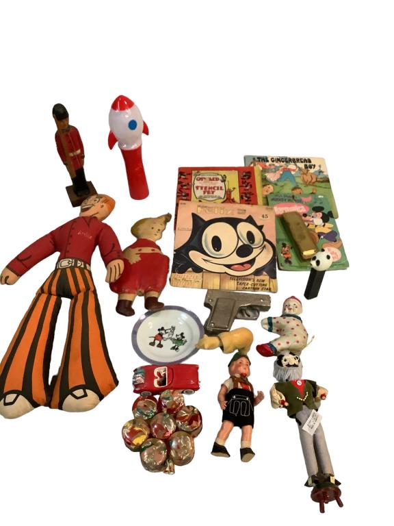 Group Assorted Vintage Toys: Dick TracyCap gun, Archie cloth doll, Felixthecat record, Sluggo cloth doll, Oswald stencil set, Mickey Mouse harmonica, light up rocket ship hand help toy,