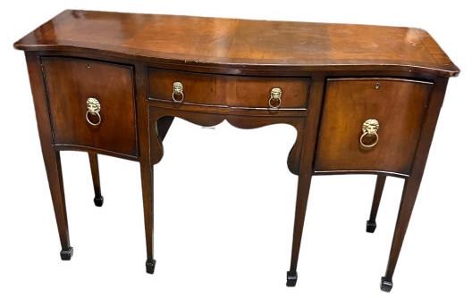 1920s Serpentine Front English Sideboard: Mahogany , banded doors and drawer, bottle drawer no divider, Lino heads pulls, spade feet, 35.5 tall x 54 wide x 21 deep great size