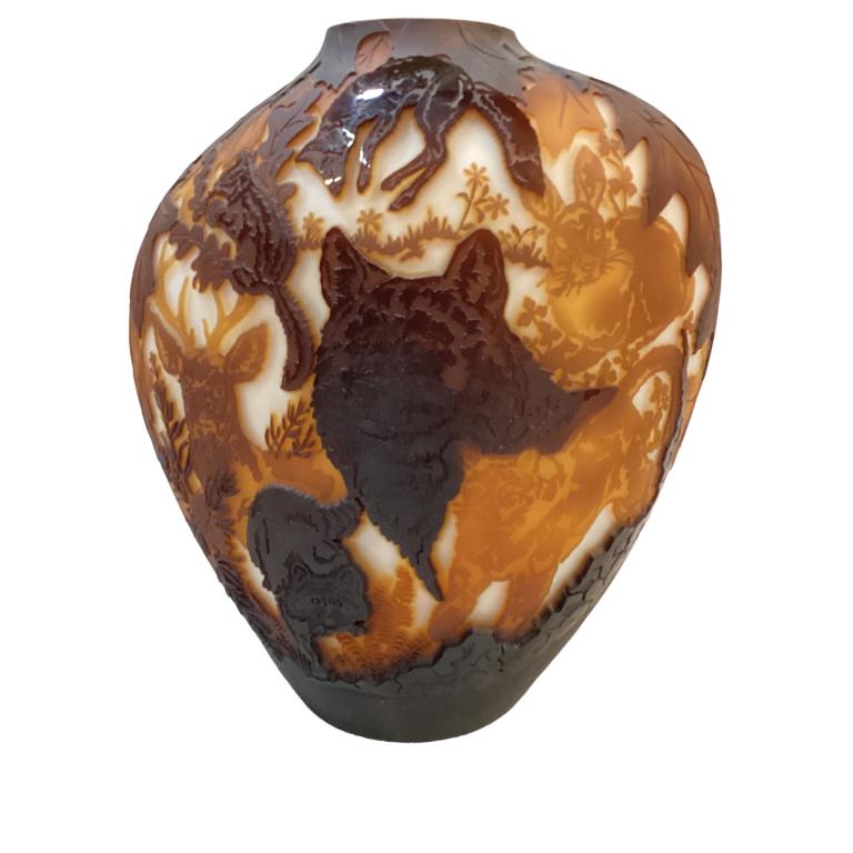 Kelsey Pilgrim Glass Cameo Vase: Layered cut cameo glass 12.5 inch vase, Forest foliage, with Deer, Wolf, Fox, Raccoon, and other woodland creatures shaded browns cut to ivory body, finely executed and signed Kelsey/ Pilgrim dated 19