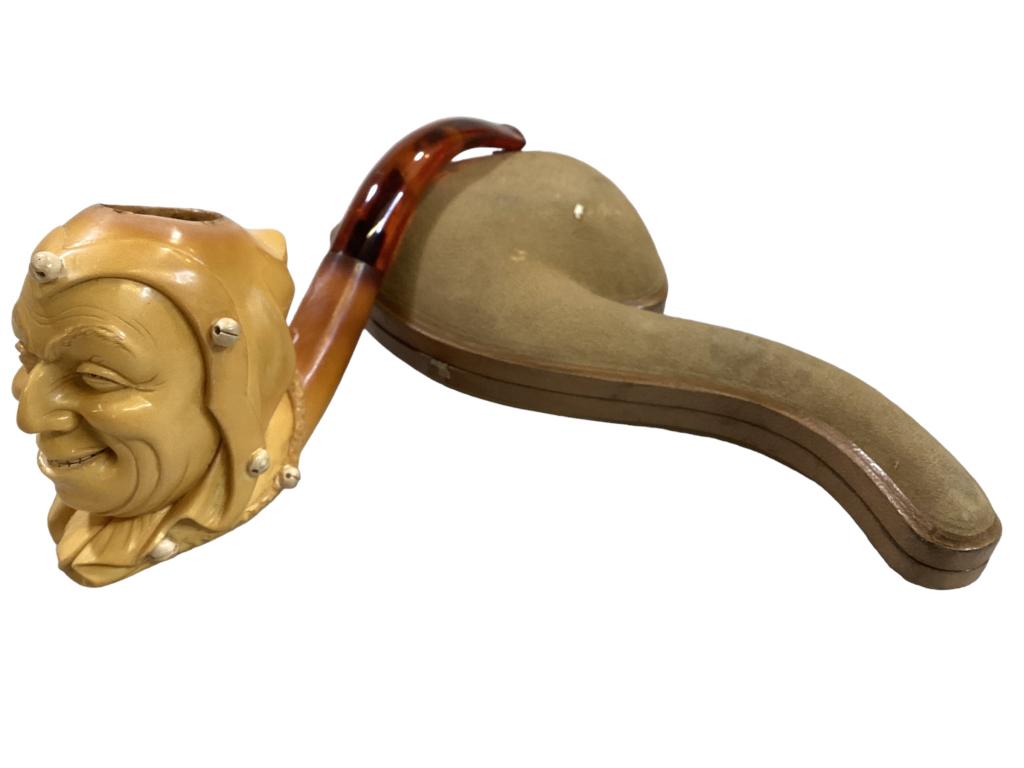 Meerschaum Jester Pipe: 7 inch English Meerschaum pipe Court Jester detailed facial features, smiling face, cap with bells to collar with stamped felted case Line Item # 79