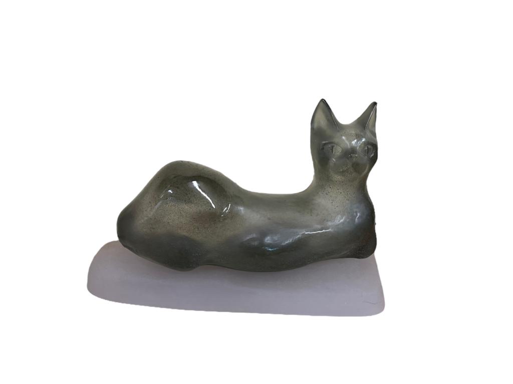 Daum Grey Pate de Verre Art Glass Cat Sculpture: Designed by Claude LHoste, edition #251/300, molded artist signature and DAUM, engraved France, overall 9.5H x 16W x 7D..base with surface scratches, overall good condition 24