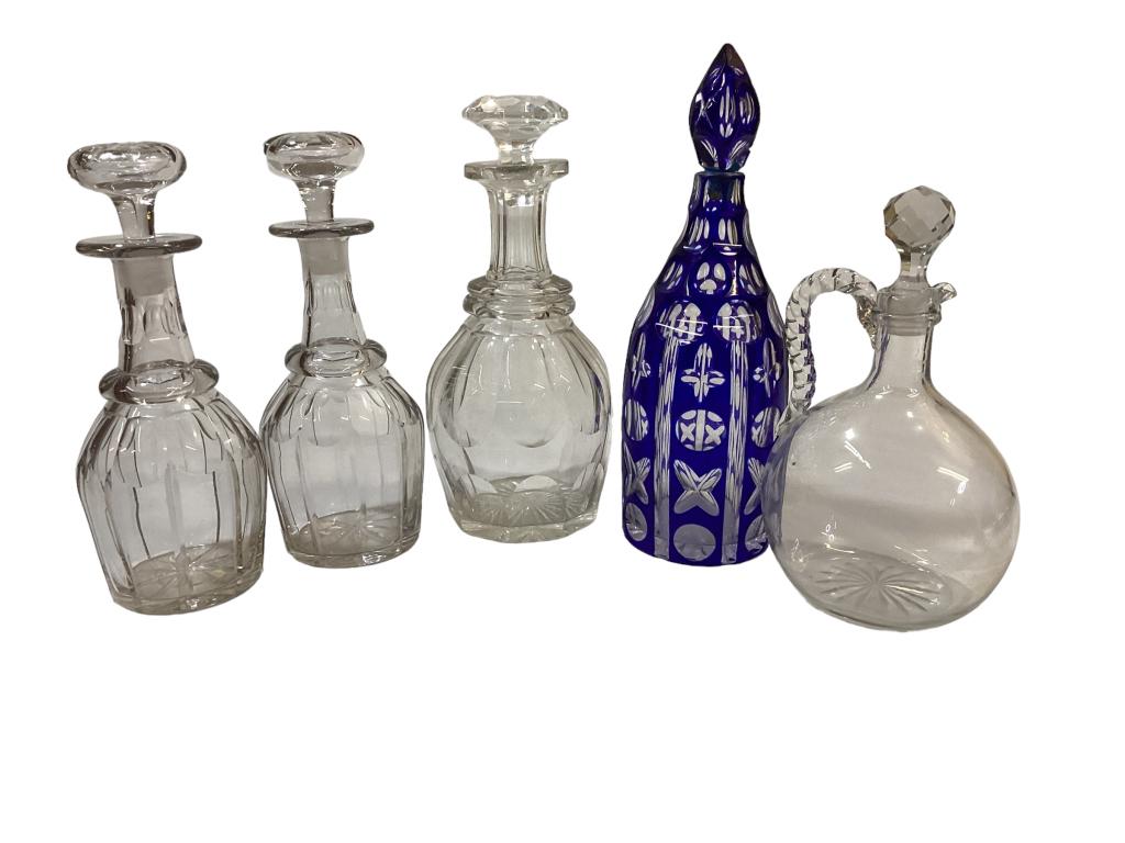 Decanters, Wine Jug: Pair 10 inch panel cut decanters, with thumb print neck, 12 inch Bohemian Cobalt cut decanter, 10.5 inch panel cut, 9 inch wine jug with rope handle * clouded interiors, Bohemian bottle has chip at ne