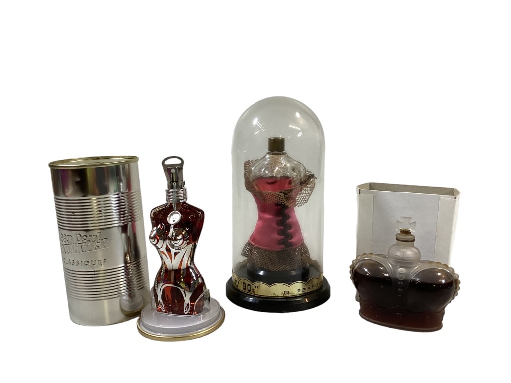 3 Perfume Bottles: Jean Paul Gaultier Classique Spray in corset bottle, tin can container, 30 mm, Milart Naughty 90’s parfume female form with bustier in pink, partial contents, original dome display cover, Matchabell