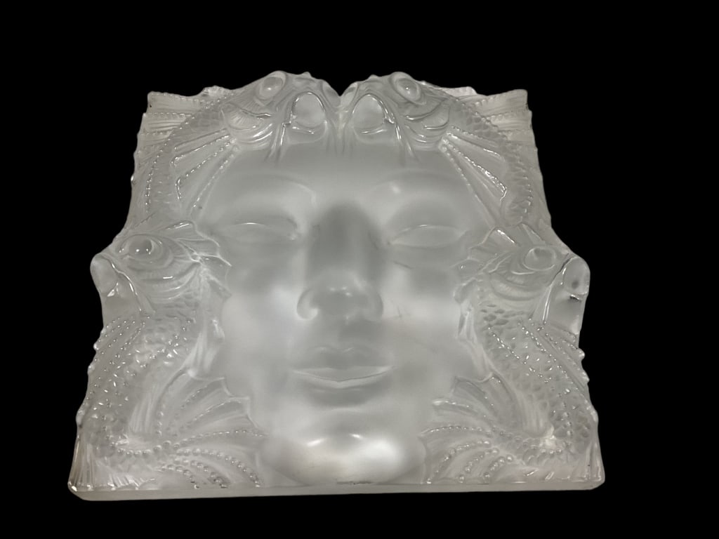 Lalique The Mask De Femme: Frosted Art Glass featuring a woman’s Face with Fish surround, 13.5 x 12.5 x 2.5 inches, designed in 1935 originally as a fountain ornament, comes with plated display stand, heavy, paint along borde