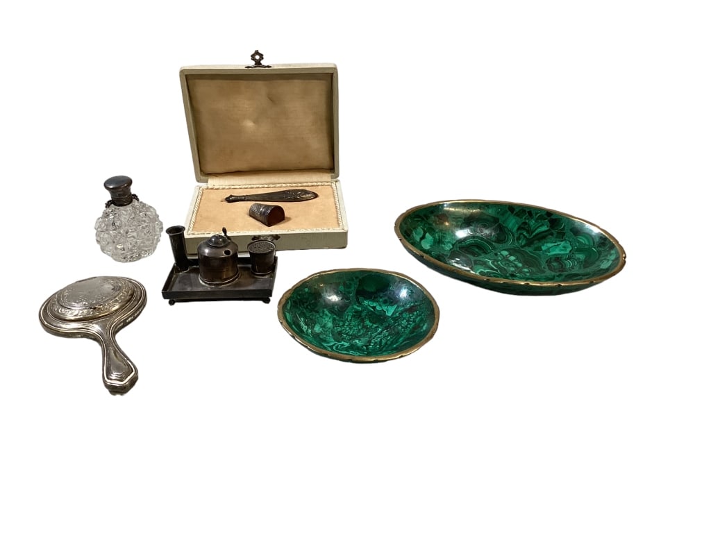 Collection of Table Articles: Deer Kiss silver compact shaped as a hand mirror, 3 inch cut glass scent bottle with plated cap, silver? Miniature inkwell desk set, boxed thimble and needle case, 4 inch and 6 inch Malachite small bo