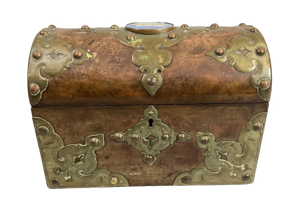 Unusual Jewelry Casket: 7 x 9 inch dome top jewelry casket, burled wood with multiple brass inlay hardware, Cameo cut medallion in Wedgwood style to center, interior retains traces of old lining