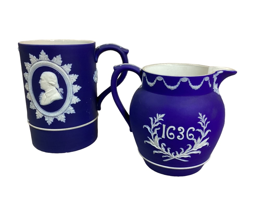 2 Wedgwood Etruria Commemorative Articles: Ben Franklin and George Washington 5 inch tall mug in deep blue, relief portraits in oval foliate, 4.5 inch pitcher dated 1636-1790 commemorative Rhode Island US Constitution ratification