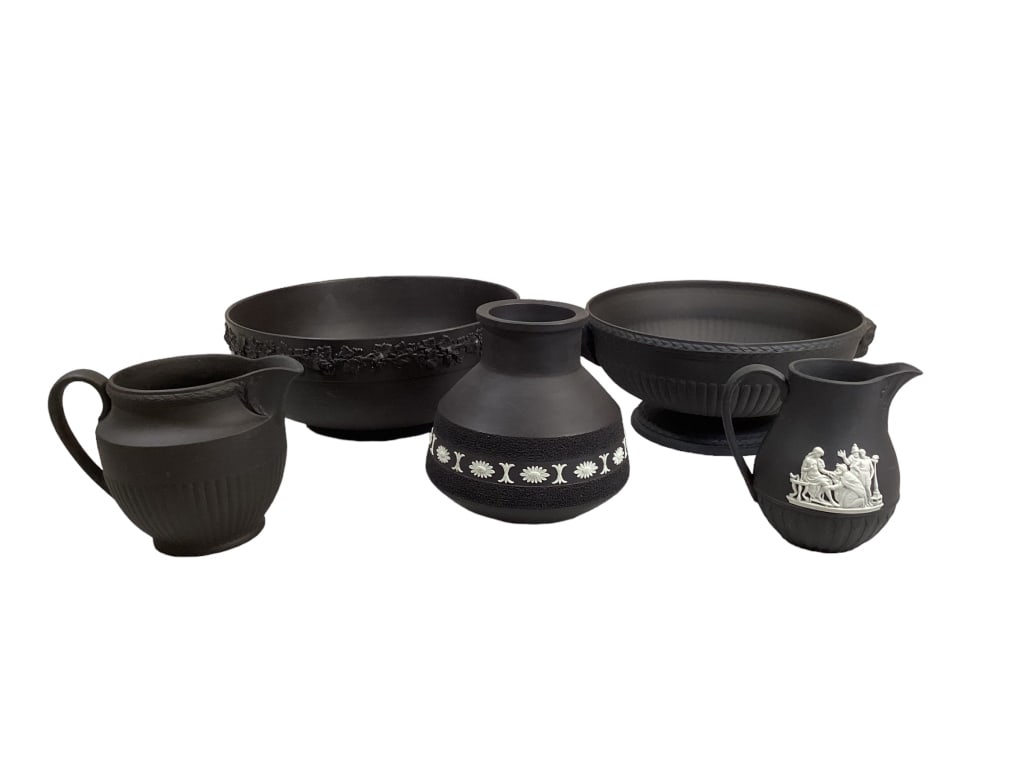 5 Pieces Wedgwood Basalt: 10 inch open bowl, grape vine rim, , 10 inch footed bowl, rams head handles, 6 inch tall vase with daisy border, 5 inch pitcher with blanc Grecian designs, 5 inch tall pitcher with paneled body, all m