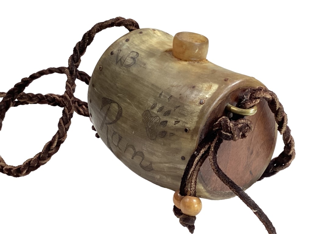 Carved Horn Rum Keg: Unusual Carved horn carrying keg. Engraved Rum, and dated 1756. Also with a Bear paw, and initials of WB. 24 inch braided leather shoulder strap. Carved mouth opening, wooded end caps, fill hole. No p
