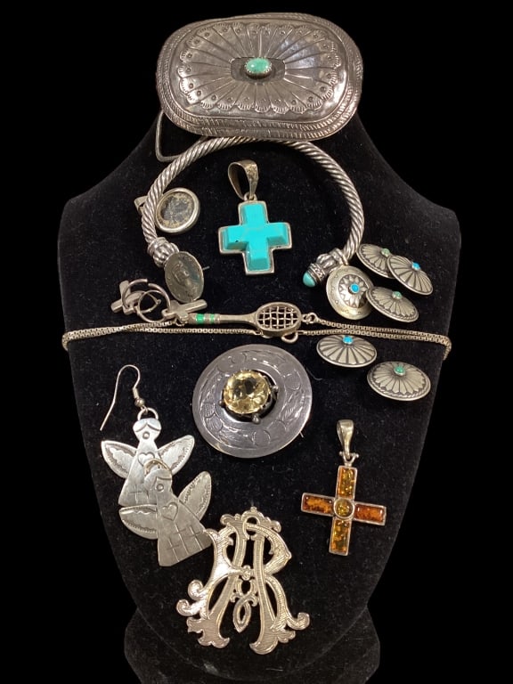 Collection of Sterling Jewelry: English sterling brooch with citrine stone in Scottish style, pair angel earrings, sterling bracelet with turquoise ends, sterling and amber stone cross pendant, Mexican style belt buckle ( not marked
