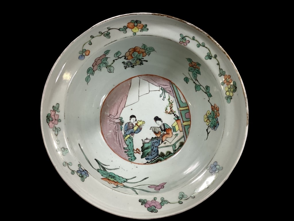 Chinese Famille Porcelain Basin: 11.5 inch porcelain bowl, interior design of figures reading scroll… deep well, banded flaring rim. Traces of gilt remain. Dry foot base. Line Item # 30