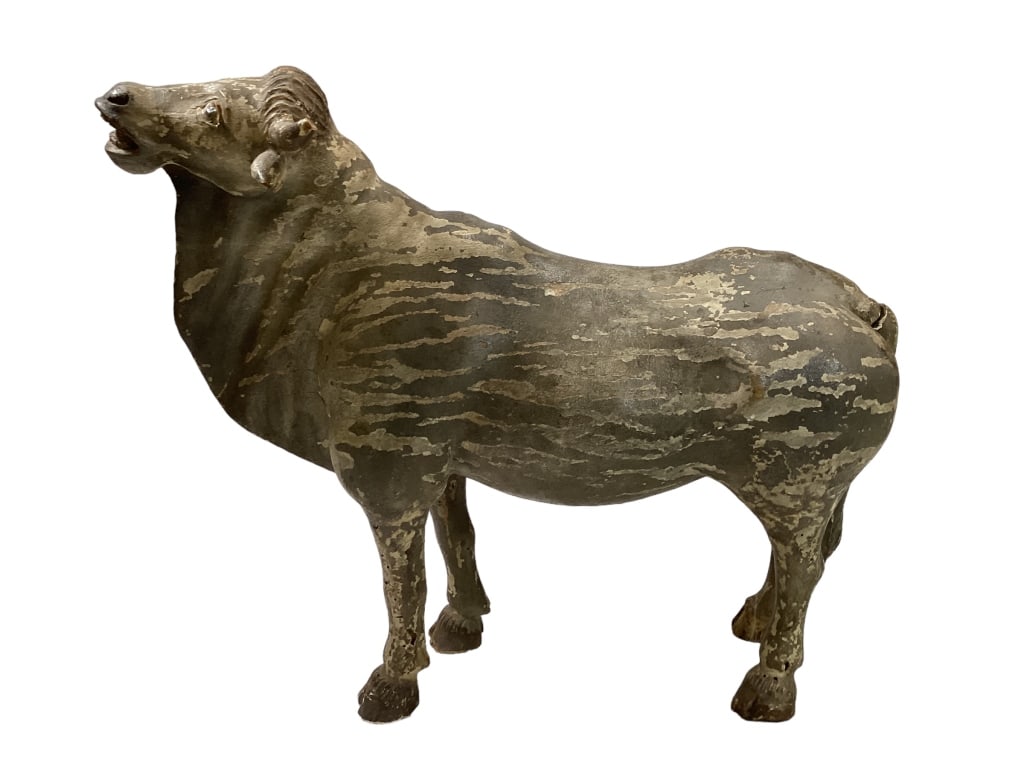 Carved Wooden Water Buffalo: Carved and painted figural Water Buffalo, 13 x 14 inches, painted eyes, open mouth, appears as carved in one piece, note tail has been broken at hip. * trace paint to body Line Item # 64