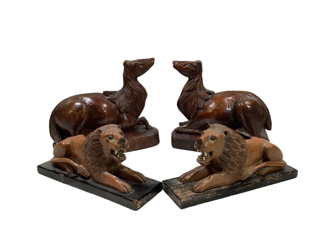Two Carved Animal Figural Bookends: Polished carved wood Persian style camels, 8 x8.5 inches, resting on carved plinth, and pair of carved Guardian Lions, detailed Saggy manes, open mouth, teeth painted eyes Line Item # 8,14