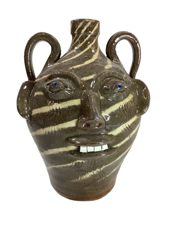 Walter Fleming Face Jug: 12 inch swirl face jug, porcelain teeth, bug eyes, double loop handle Line Item # 35