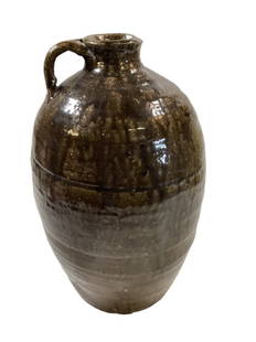 4 Gallon Southern Pottery Fluid Jug: Rich brown to green glaze, large spot, applied handle. Marked 4 at shoulder Line Item # 12