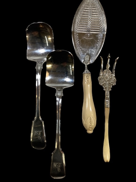 English Sterling Service Pieces: Sterling and bone handle fish server at 12 inches, pierce blade, 9 inch bone and sterling serving fork, two serving spoons at 10 1/4 inches ..hallmarked with Lion Passant and Leopard Head Line Item # 