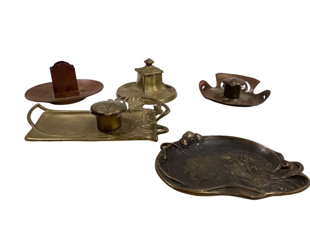 Art Nouveau Inkwells, Tray: 5 pieces, brass Geschutzt inkwell with lily decoration, extended tray, lidded inkwell, 4 inch circular tray base, signed Geschutzt copper ink well, pierced tray, copper ashtray match holder, bronze tr