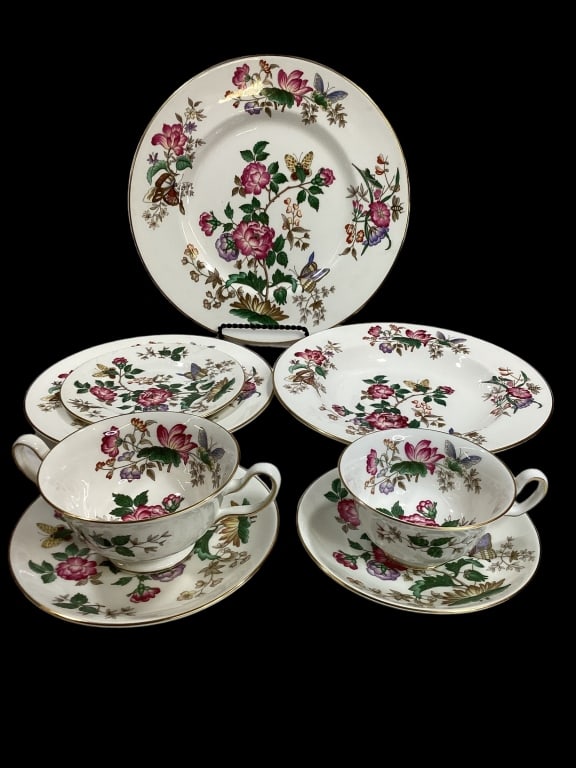 Wedgwood Charnwood China: Pattern is a lovely country style rose with butterflies..60 plus pieces: eight each: 10 3/4 inch dinner plates, 9 inch rim soup bowls, 6 inch bread and butter, cream soups with under plates, twelve 8