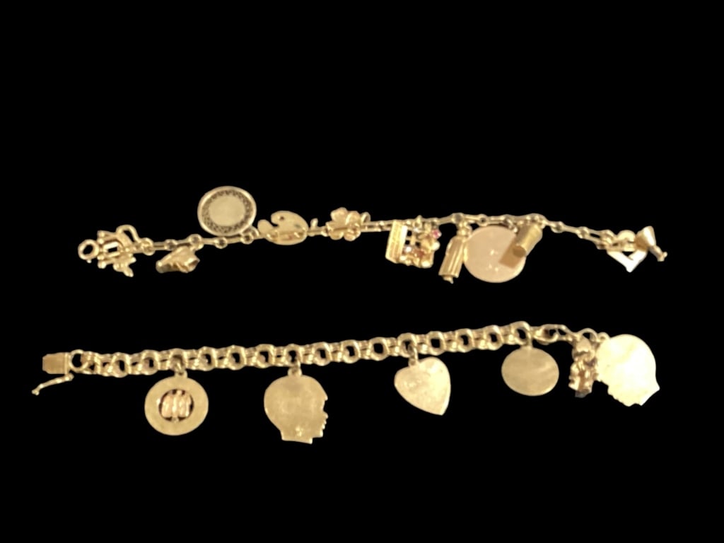 Two 14 K Yellow Gold Charm Bracelets: Vintage Double Link, with heart bracelet with ten 14 k gold charms, and one 12 gold filled, chain bracelet with five 14 k gold charms, both 7 inches in length