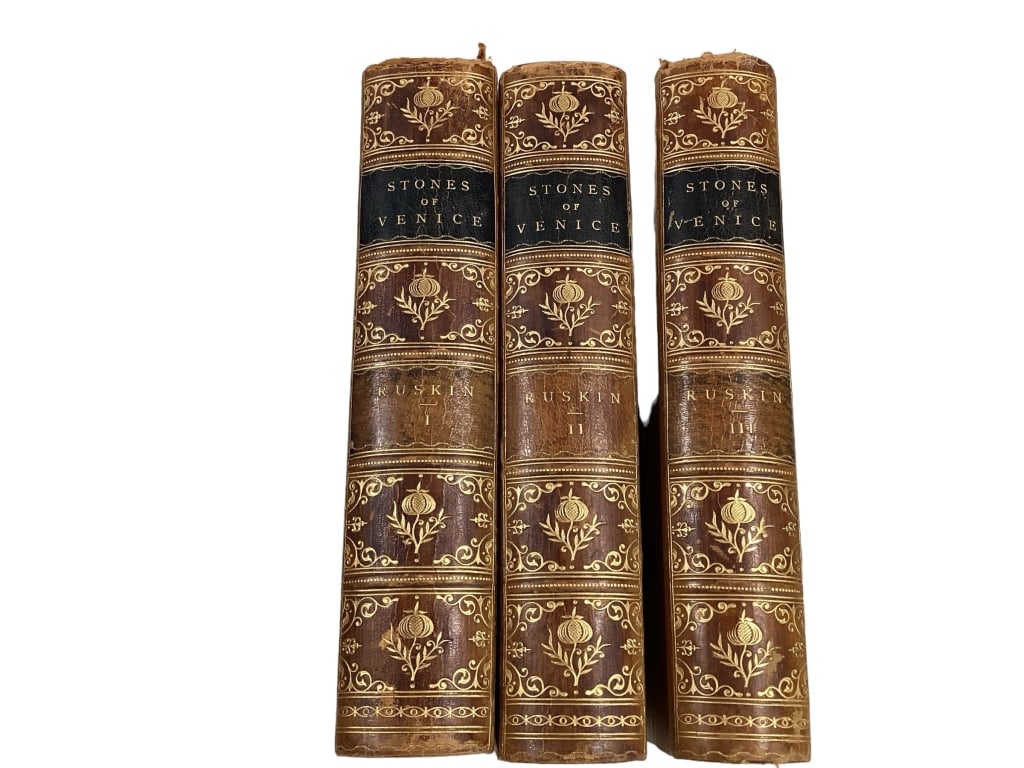 Three Volumes John Ruskin, Stones of Venice: Three Volume set, half tooled leather binding, gilt page ends, spine printed Mew York, John W. Lovell Company.. The Foundations, The Sea Stories, The Fall?* pencil notations to fly pages, light tonal