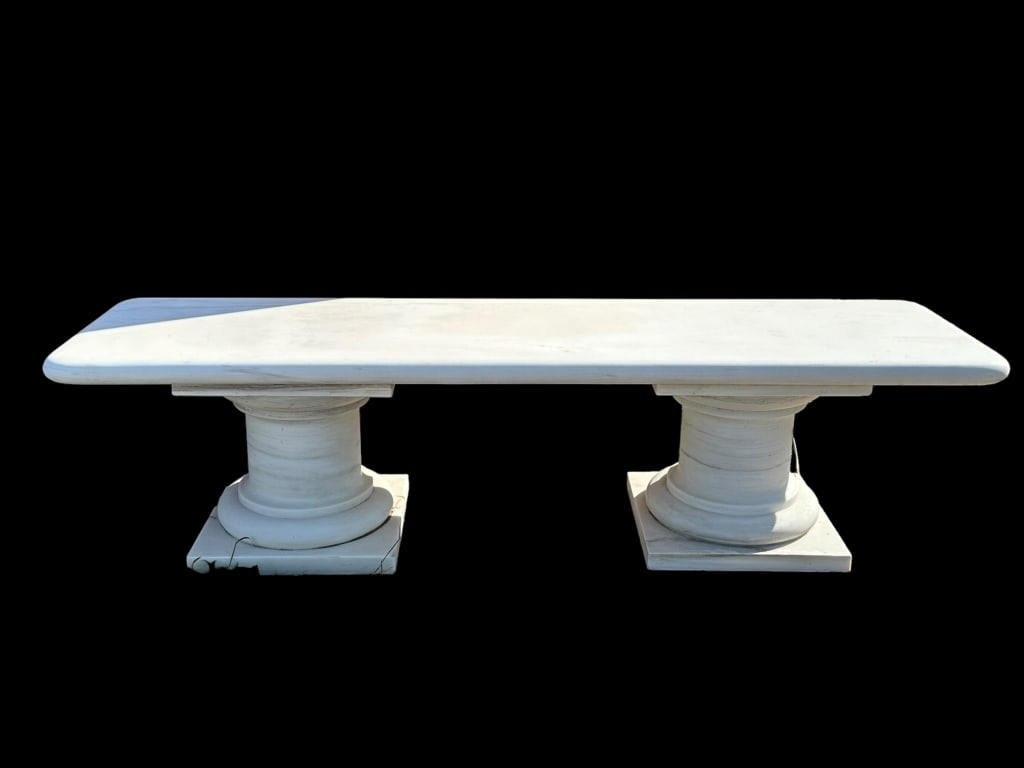 Marble Garden Bench: Doric style bases with long slab seat, top separate from bases, age related wear from outdoor placement, heavy..18H x 72W x 20D Line Item # 0
