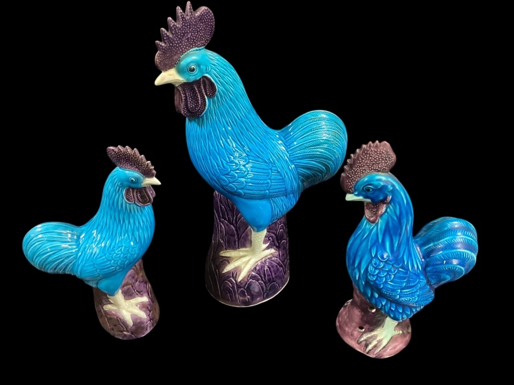 Three Asian Slip Glazed Porcelain Roosters: Large 14 1/4 inch tall rooster, in fine turquoise blue glaze, with aubergine base, comb and wattle, two similar roosters at 9.5 inches tall.