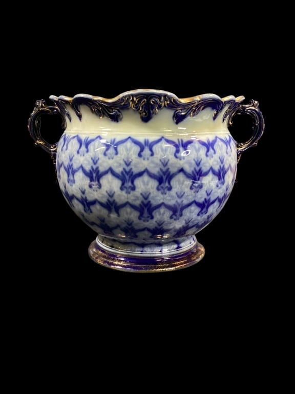 Continental Porcelain and Gilt Jardinere: Large size cobalt and ivory Jardinere with gilt trims, flared scolloped rim, stepped base, double foliate handles. Stamped 853 in gilt at base* use evidence, crazing , hairline at rim
