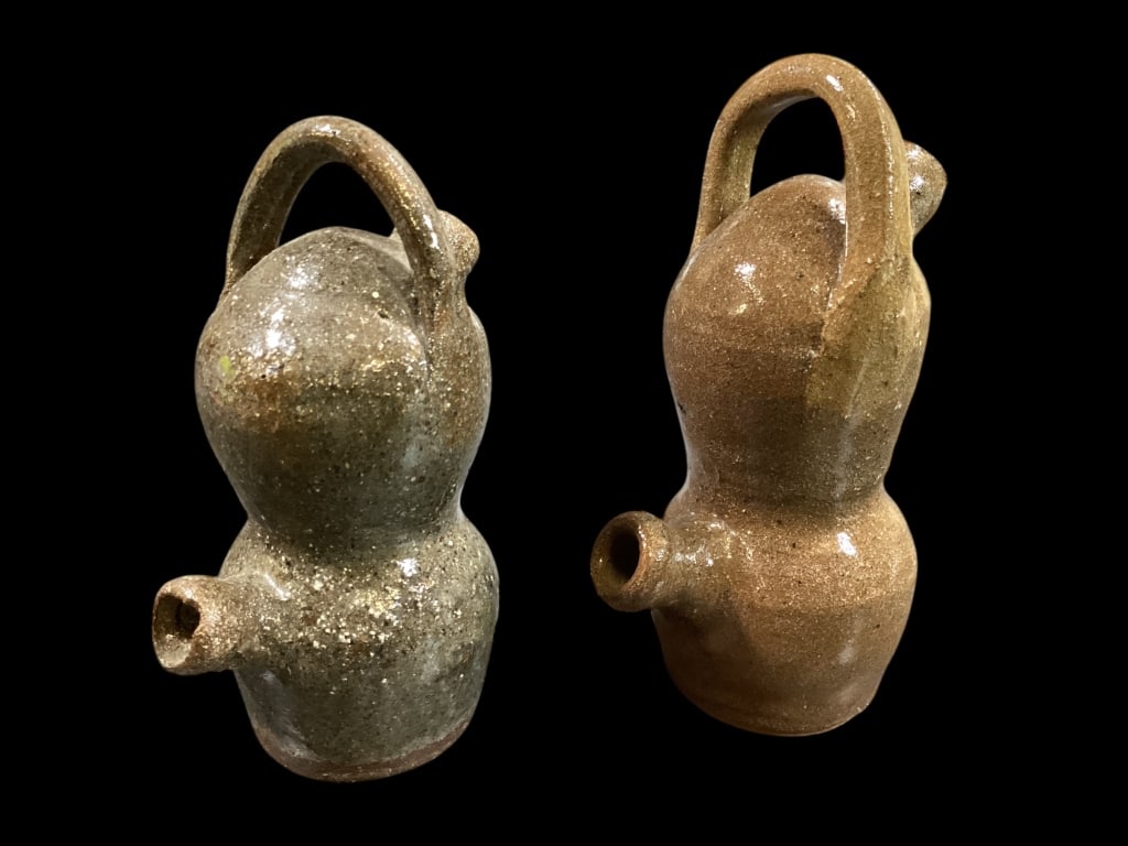 Two Miniature Burlon Craig Field Hand Jugs: 6 a d 5 3/4; inches, taller in glossy brown glaze, smaller jug with frog skin