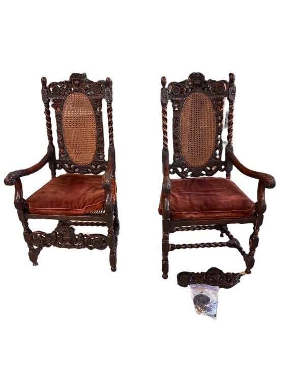 Pair Carved Jacobean Barley twist open armchairs: Mid 19th C, British, one decorative stretcher is damage.