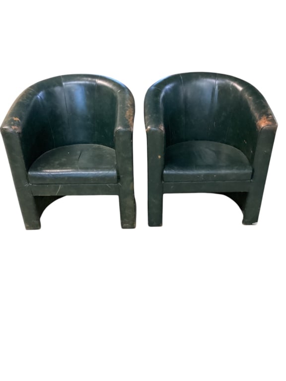 Barrel back club chairs: Green leather, Shows sign of wear and discoloration, size 32x28x24 seat height 16 inches