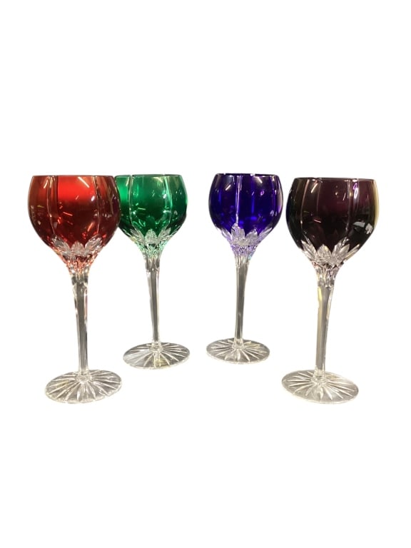 Set Four AJKA Crystal Stems: Made in Hungary by glassmaker AJKA, the set of wine stems features 4 varied colored stems at 8 1/4 inches. One with paper label