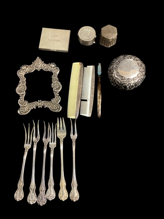 Group of Sterling Silver Oddities: Repousse 2.5 inch decanter topper ( broken stem), Six varied design seafood forks, baby combs and toothbrush, 3 inch picture frame, , compact, 2 pill boxes