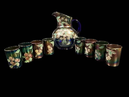 Fenton Carnival Glass Water Set: Hand Painted Cherry Blossom water set consisting of 10 inch bulbous pitcher with matching set of six tumblers, cobalt blue with hanging cherries in pink to red with leafy foliage