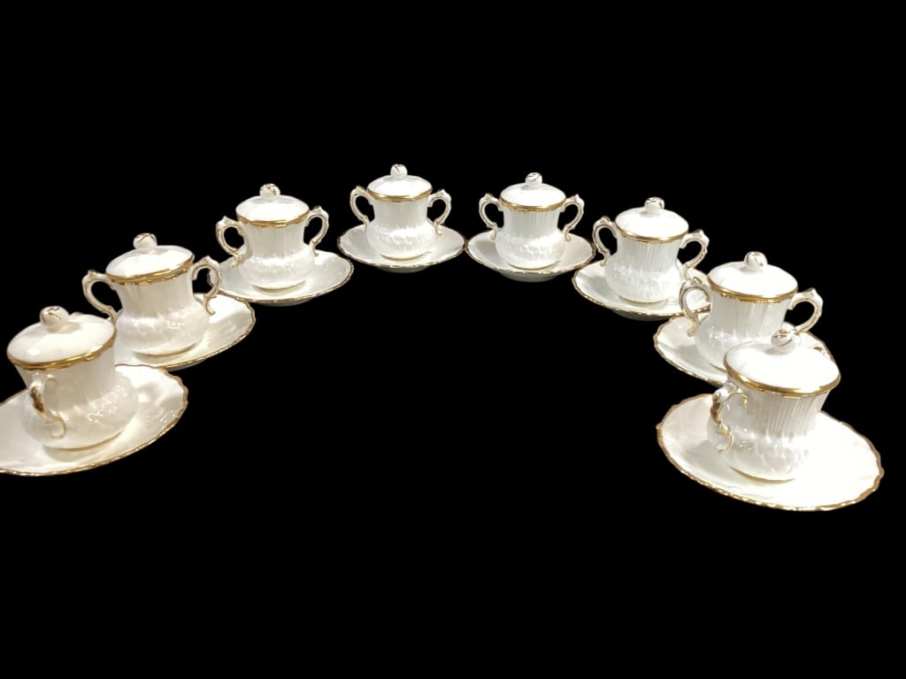 Tiffany and Company Pot de Cr?me: Set of 8, Hammersley and Company for Tiffany and Company New York, covered pot de cr?me sets, bone white with gilt accents, Thistle and rose Bud finials, delicate handles, matched under plates. Line I
