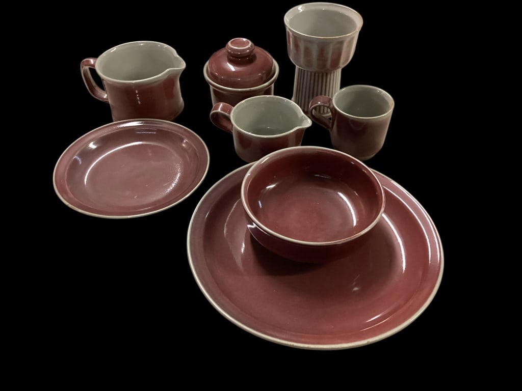 Iron Mountain Stoneware: Plum Red pattern, approximately 71 pieces including plates in three sizes, cream, sugar, bowls, cup wine glass, covered casseroles..